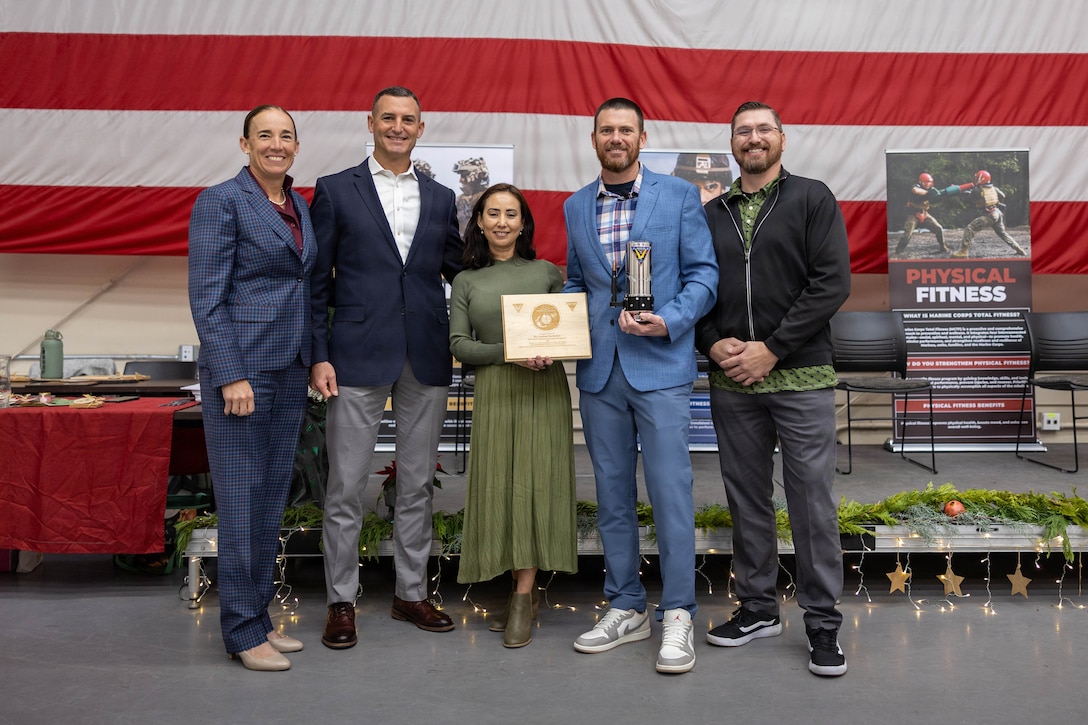 9th annual Joint Leadership Education Conference, From left to right, U.S. Marine Corps Col. Christine M. Houser, the commanding officer of Marine Corps Air Station Camp Pendleton, Col. Fleming, commanding officer of Marine Aircraft Group 39, 3rd Marine Aircraft Wing, and retired Staff Sgt. Seif, silver metal star recipient, pose at the 9th annual Joint Leadership Education Conference at MCAS Camp Pendleton, California, Dec. 10, 2025. The conference is a two-day event featuring panels and presentations on leadership, personal readiness, professional development, and strategic growth. The conference also included an awards ceremony, a series of focused discussions ranging from trauma informed leadership and relationship dynamics to financial readiness, tuition assistance, and health fundamentals. (U.S Marine Corps photo by Lance Cpl. Estrada)