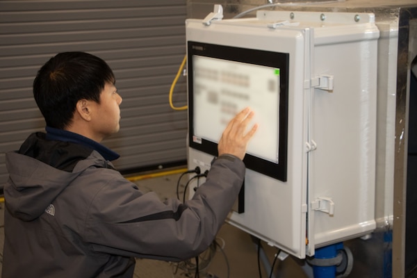 ERDC Researcher Dr. Andy Hur makes adjustments to the controls of the Heat Driven Atmospheric Water Generation (HeatDAWG) proof-of-concept experimentation apparatus located at ERDC’s Construction Engineering Research Laboratory in Champaign, Illinois.
