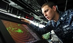 NORFOLK, Va. – Operations Specialist 2nd Class Michael R. Gutermuth reads the SPS 73 radar on the bridge of the amphibious transport dock USS San Antonio (LPD 17). San Antonio is preparing to depart Naval Station Norfolk to provide Humanitarian Aid/ Disaster Relief in the wake of Hurricane Sandy. (U.S. Navy photo by Mass Communication Specialist 3rd Class Zachary S. Welch/Released)