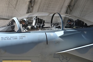 U.S. Air Force Maj. Aaron Eshkenazi, F-15EX Test Director for the 84th Test and Evaluation Squadron, performs preflight procedures for the F-15EX with Under Secretary of the Air Force Matt Lohmeier, at Eglin Air Force Base, Florida, December 11, 2025. During his visit, Lohmeier gained valuable insights from the 84th TES and 85th TES to help inform future decisions regarding the platform. The future F-15 fleet will complement 5th generation aircraft, bringing substantial additional capacity for over-sized long-range fires, sensors, and electronic warfare capabilities to defend critical locations in highly contested areas. (U.S. Air Force photo by Capt. M. Ryan Goss)