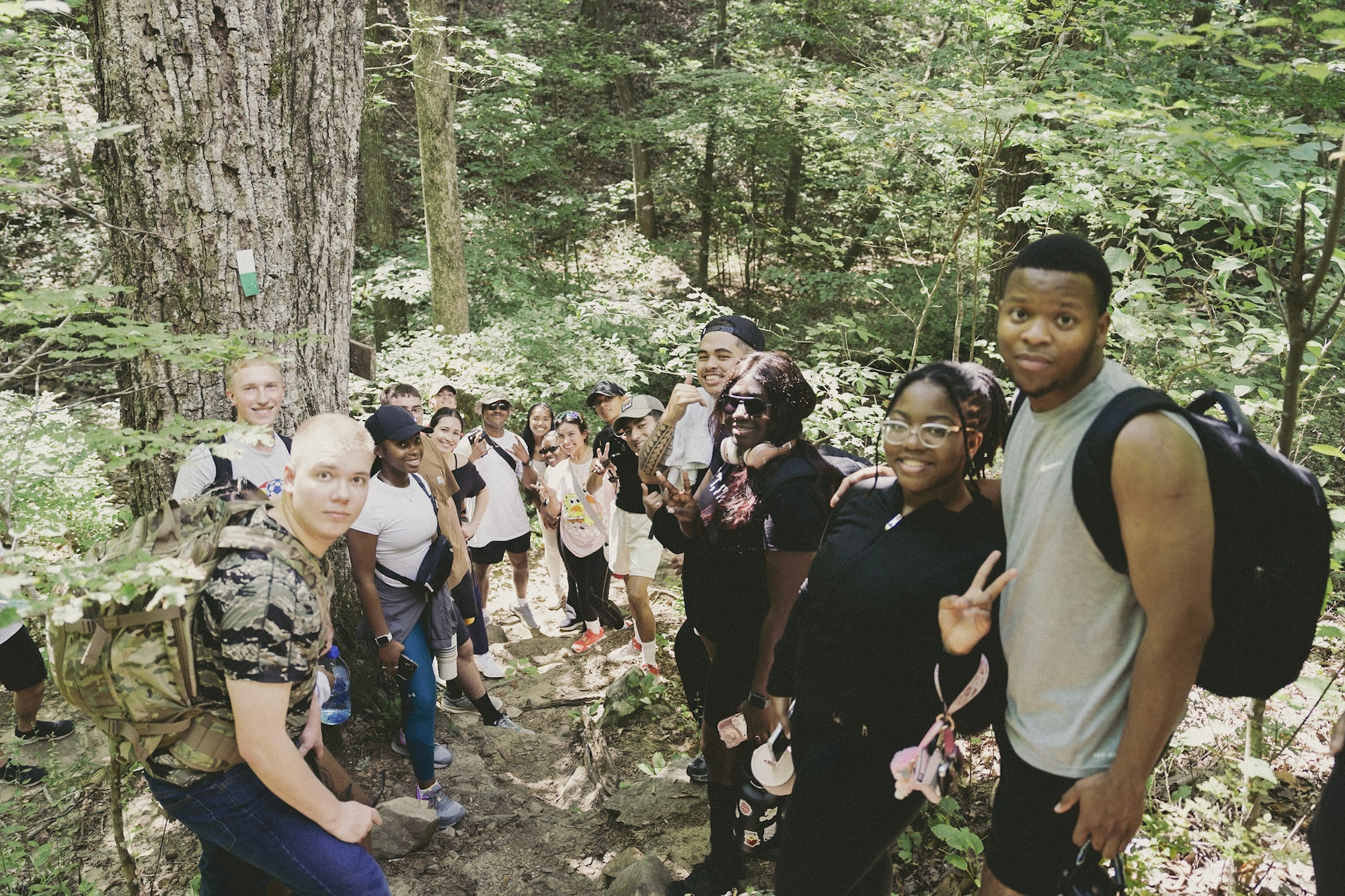 Airman 1st Class Alexia Lassin, a contracting specialist assigned to the 42d Contracting Squadron, pose for a photo during a hiking trip with Maxwell dorm residents at Oak Mountain State Park, Aug. 31, 2025.