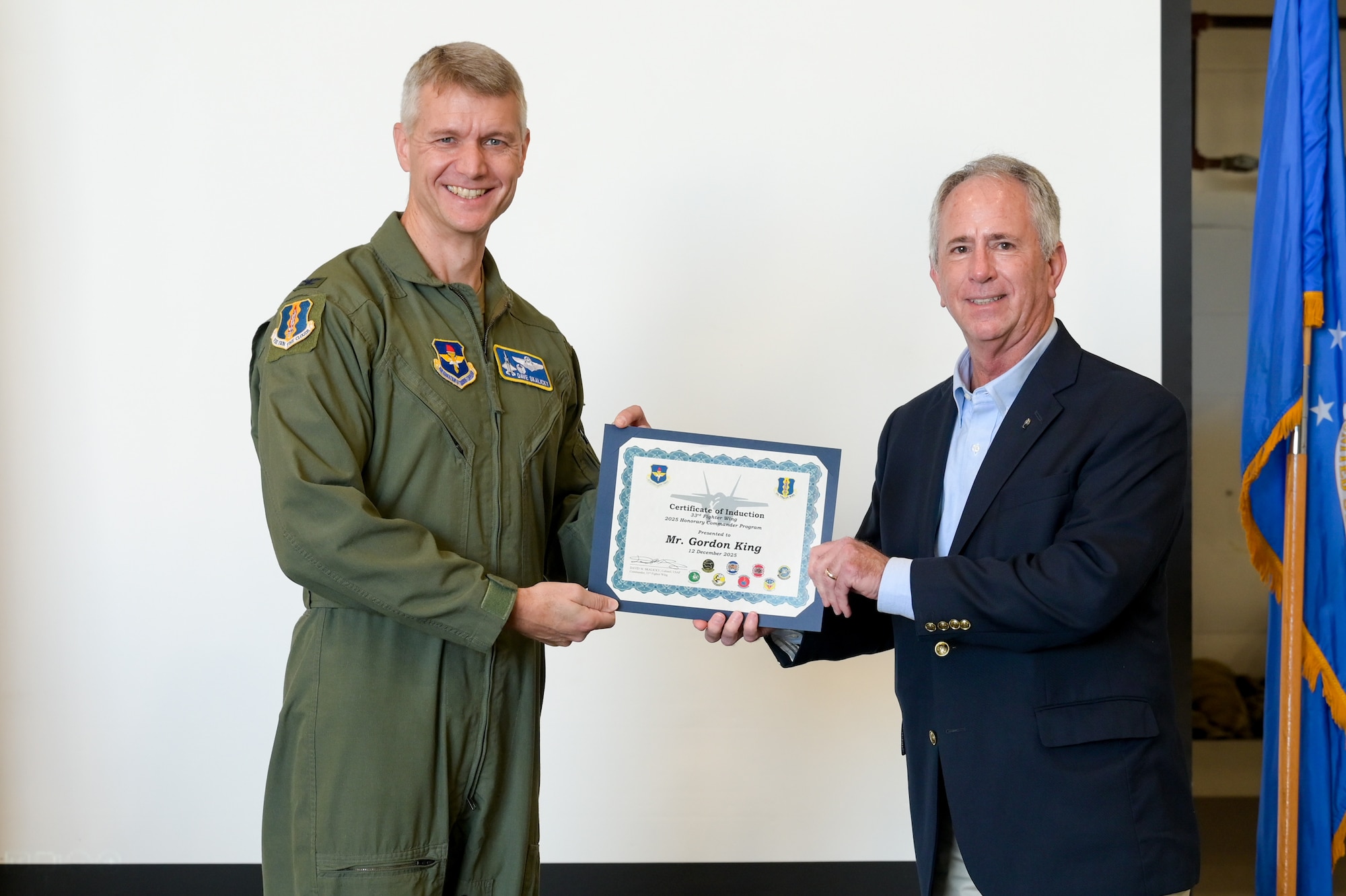 A photo of people posing.