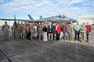 A photo of people posing.