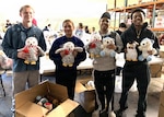 Corpsmen care in the community… Junior Enlisted Association hospital corpsmen from Navy Medicine Readiness Training Command Bremerton volunteered at a local toy drive which delivers directly to children receiving care in Puget Sound–area hospitals (courtesy photo)