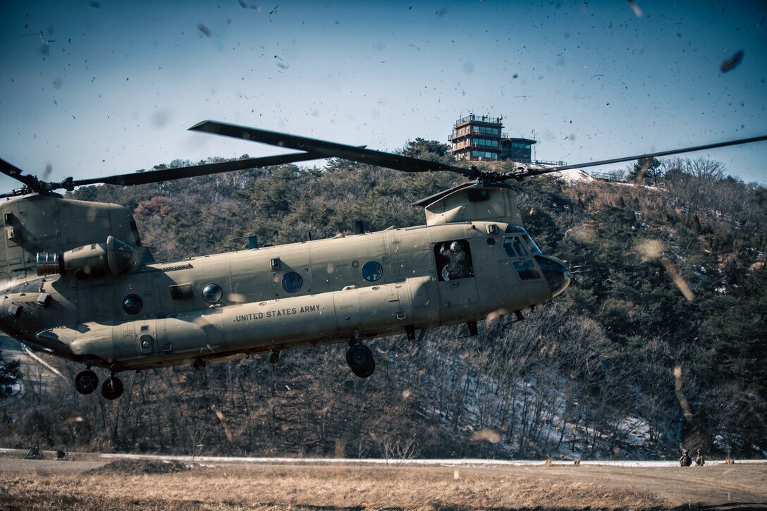 A Boeing CH-47 Chinook helicopter lifts-off during a live-fire exercise (LFX) at the Rodriguez Live Fire Complex in Pocheon, Republic of Korea, on Feb. 3, 2025.