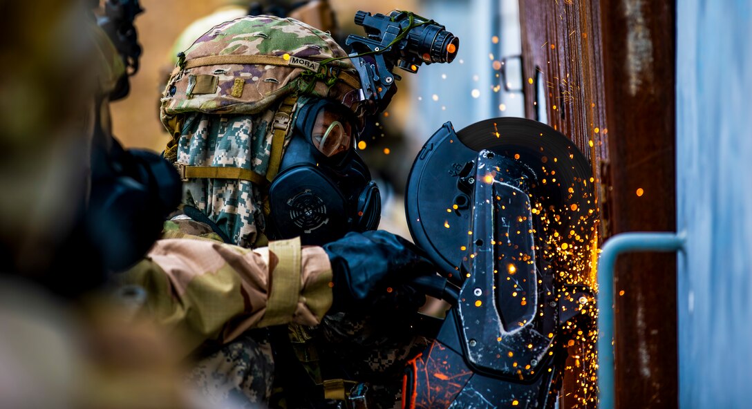 U.S. Army Soldiers from the 5-20 Infantry Battalion, 1-2 Stryker Brigade Combat Team, 7th Infantry Division, prepare to breach a facility at Twin Bridges Training Area, Yangju-si, Republic of Korea, on Mar. 12, 2025.