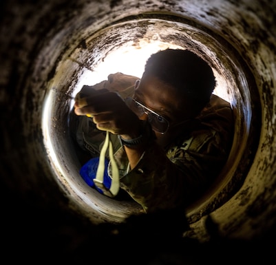 U.S. Army Pfc. Jalen Mitchell, a technical engineer assigned to the 84th Engineer Battalion, 130th Engineer Brigade, 8th Theater Sustainment Command, inspects a gap between culverts during Salaknib 2025 at Fort Magsaysay, Philippines, March 15, 2025.