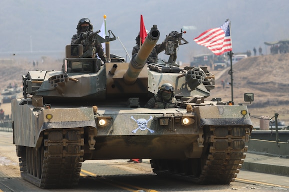 Republic of Korea army soldiers assigned to 5th Engineer Brigade, pull security on the K1 tank while it moves across M3 bridge vehicle as part of Freedom Shield 25/Combined Wet Gap Crossing training March 20, 2025 in South Korea.
