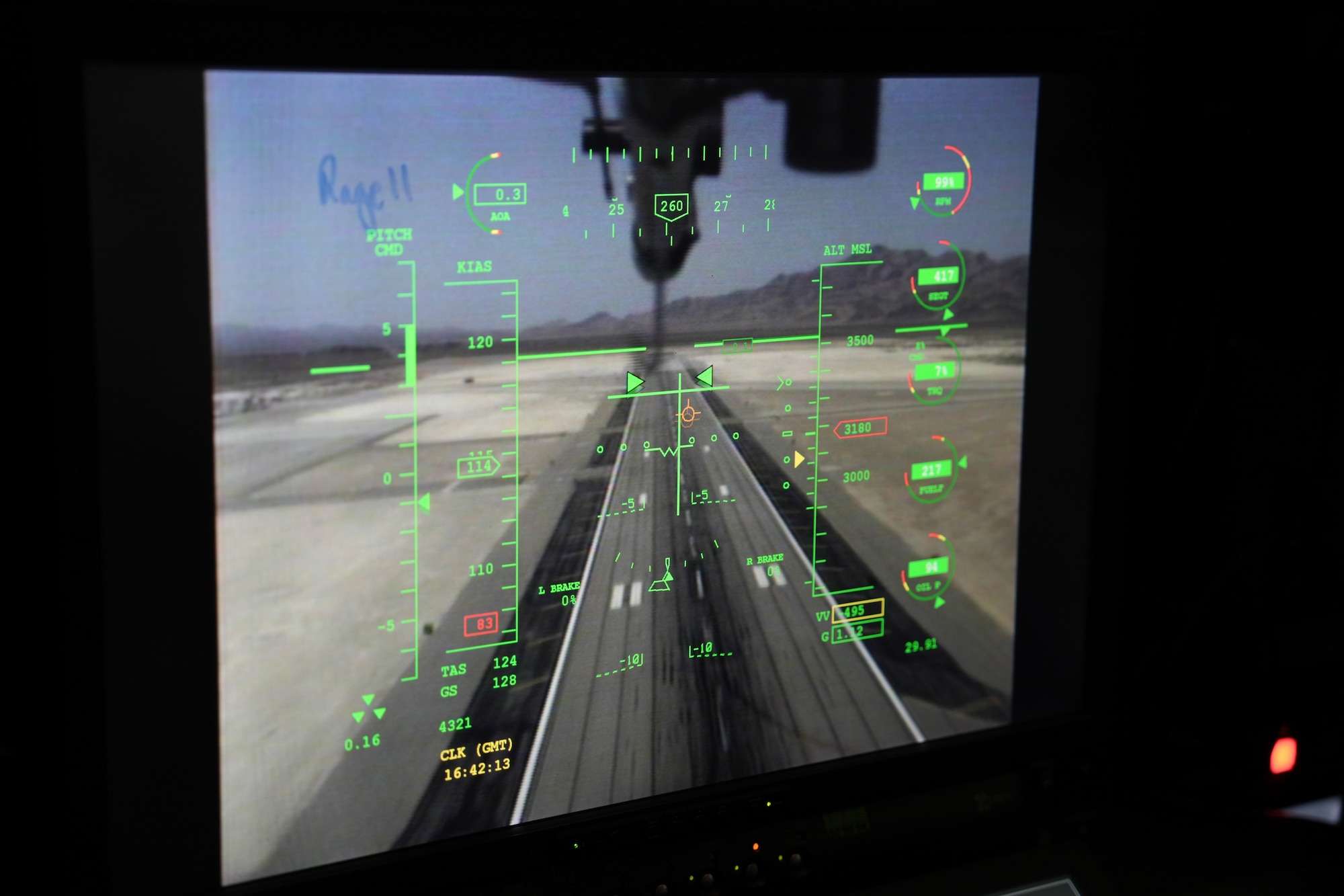 A screen shows a runway.