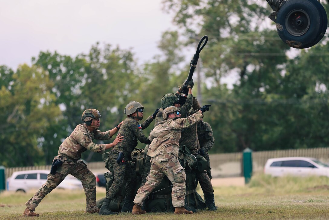 Soldiers with the Philippine Army 5th, 7th Infantry Division and U.S. Army with the Division Sustainment Brigade, 25th Infantry Division conducted combined Sling Load Tactical Operations training during Salaknib 2025 at Fort Magsaysay, Philippines, March 27, 2025.