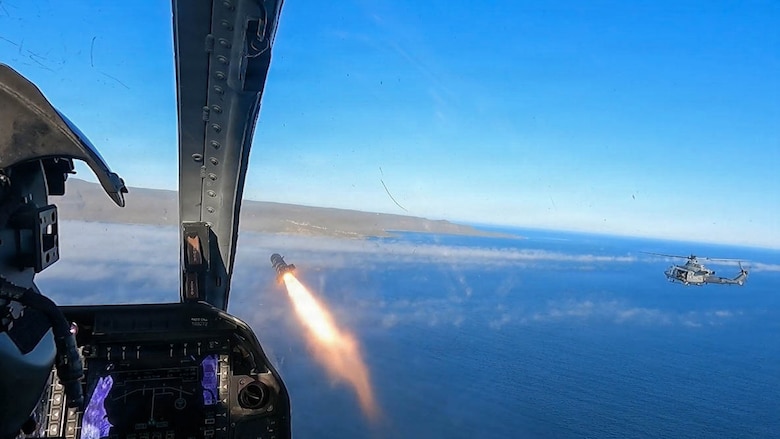 A U. S. Marine Corps AH-1Z Viper helicopter assigned to Marine Light Attack Helicopter Squadron (HMLA) 267, Marine Aircraft Group 39, 3rd Marine Aircraft Wing, fires an AGM-179 Joint Air-to-Ground Missile during Exercise Steel Knight 25, over the Pacific Ocean, Dec.11, 2025.