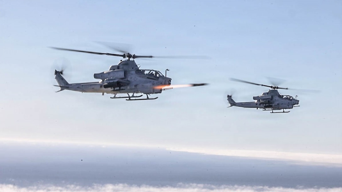 A U. S. Marine Corps AH-1Z Viper helicopter assigned to Marine Light Attack Helicopter Squadron (HMLA) 267, Marine Aircraft Group 39, 3rd Marine Aircraft Wing, fires an AGM-179 Joint Air-to-Ground Missile during Exercise Steel Knight 25, over the Pacific Ocean, Dec.11, 2025.