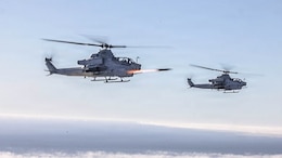A U. S. Marine Corps AH-1Z Viper helicopter assigned to Marine Light Attack Helicopter Squadron (HMLA) 267, Marine Aircraft Group 39, 3rd Marine Aircraft Wing, fires an AGM-179 Joint Air-to-Ground Missile during Exercise Steel Knight 25, over the Pacific Ocean, Dec.11, 2025.