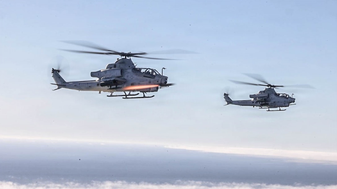 A U. S. Marine Corps AH-1Z Viper helicopter assigned to Marine Light Attack Helicopter Squadron (HMLA) 267, Marine Aircraft Group 39, 3rd Marine Aircraft Wing, fires an AGM-179 Joint Air-to-Ground Missile during Exercise Steel Knight 25, over the Pacific Ocean, Dec.11, 2025.