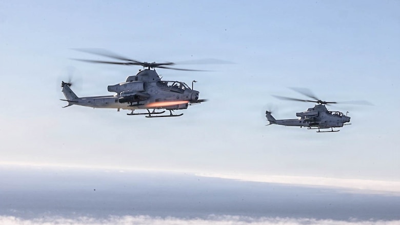 A U. S. Marine Corps AH-1Z Viper helicopter assigned to Marine Light Attack Helicopter Squadron (HMLA) 267, Marine Aircraft Group 39, 3rd Marine Aircraft Wing, fires an AGM-179 Joint Air-to-Ground Missile during Exercise Steel Knight 25, over the Pacific Ocean, Dec.11, 2025.
