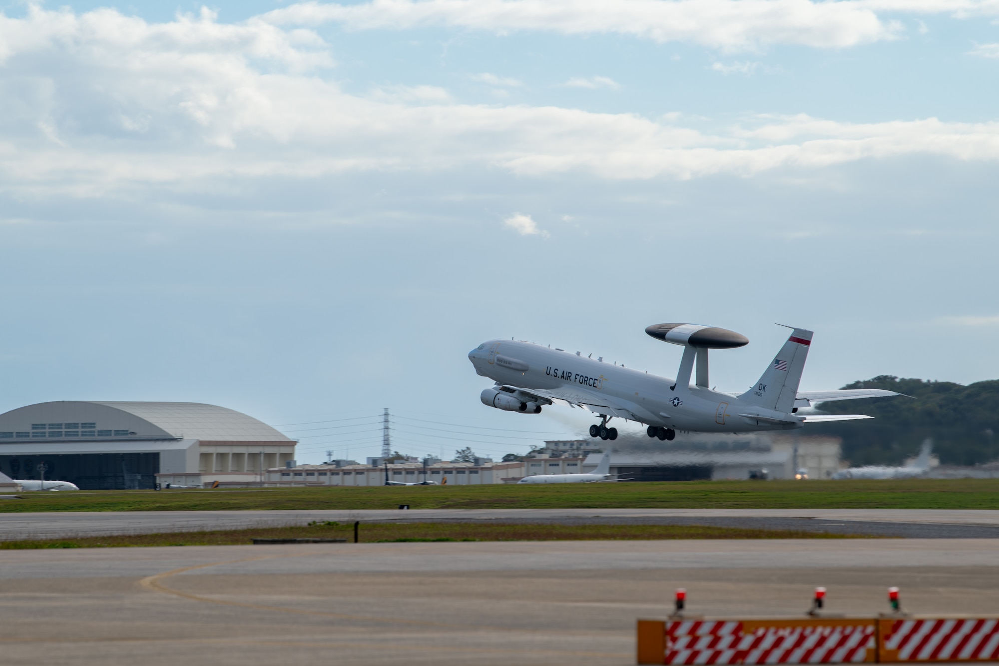 A U.S. Air Force E-3 Sentry airborne early warning and control aircraft assigned to the 961st Airborne Air Control Squadron takes off from the flightline at Kadena Air Base, Japan, Jan. 17, 2024.