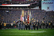 The West Point color guard presents the colors on the field of Northwest Stadium as part of the pre-game ceremonies for the 125th Army Navy football game in Landover, Md., Dec. 14,