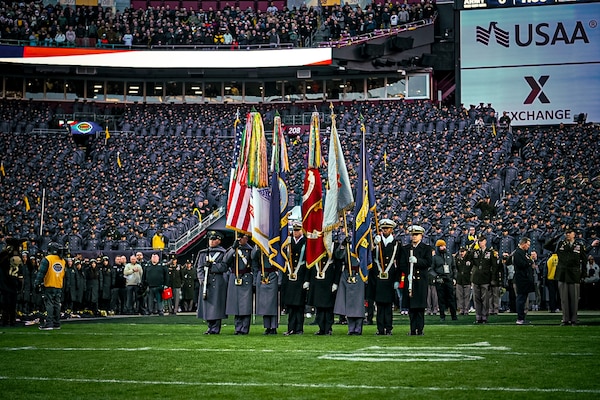 The West Point color guard presents the colors on the field of Northwest Stadium as part of the pre-game ceremonies for the 125th Army Navy football game in Landover, Md., Dec. 14,