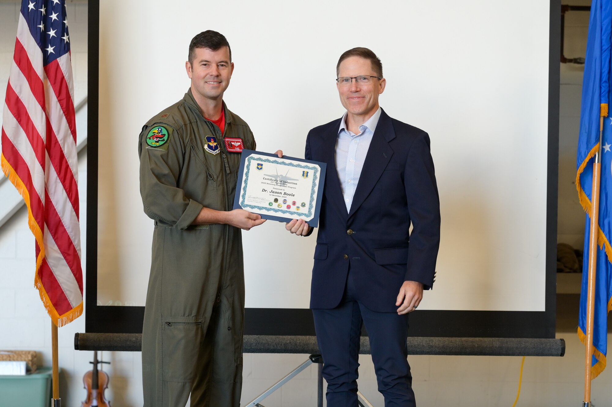 A photo of people posing.