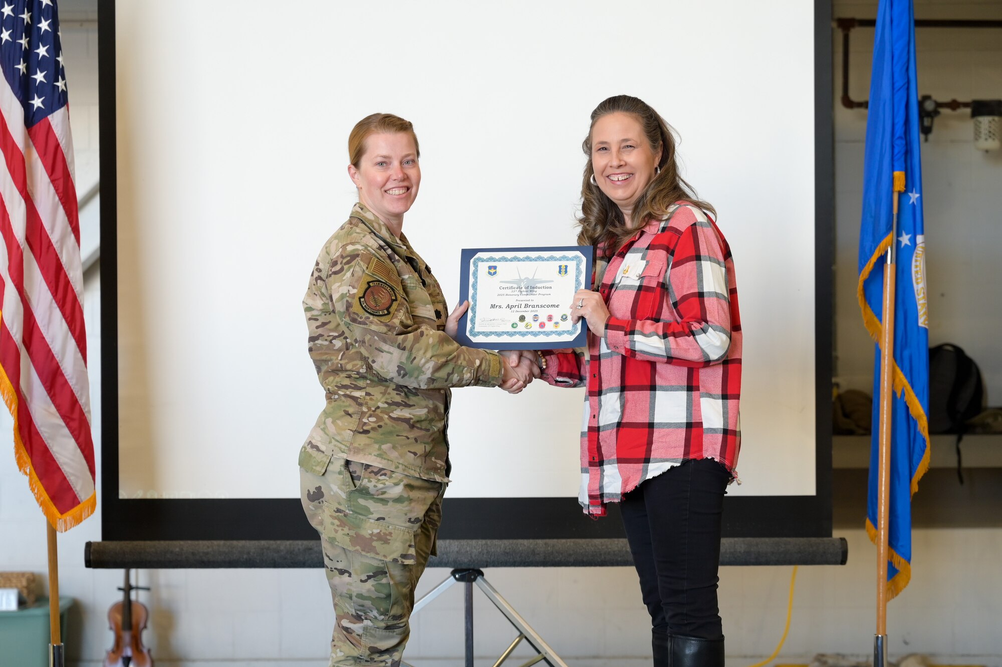 A photo of people posing.