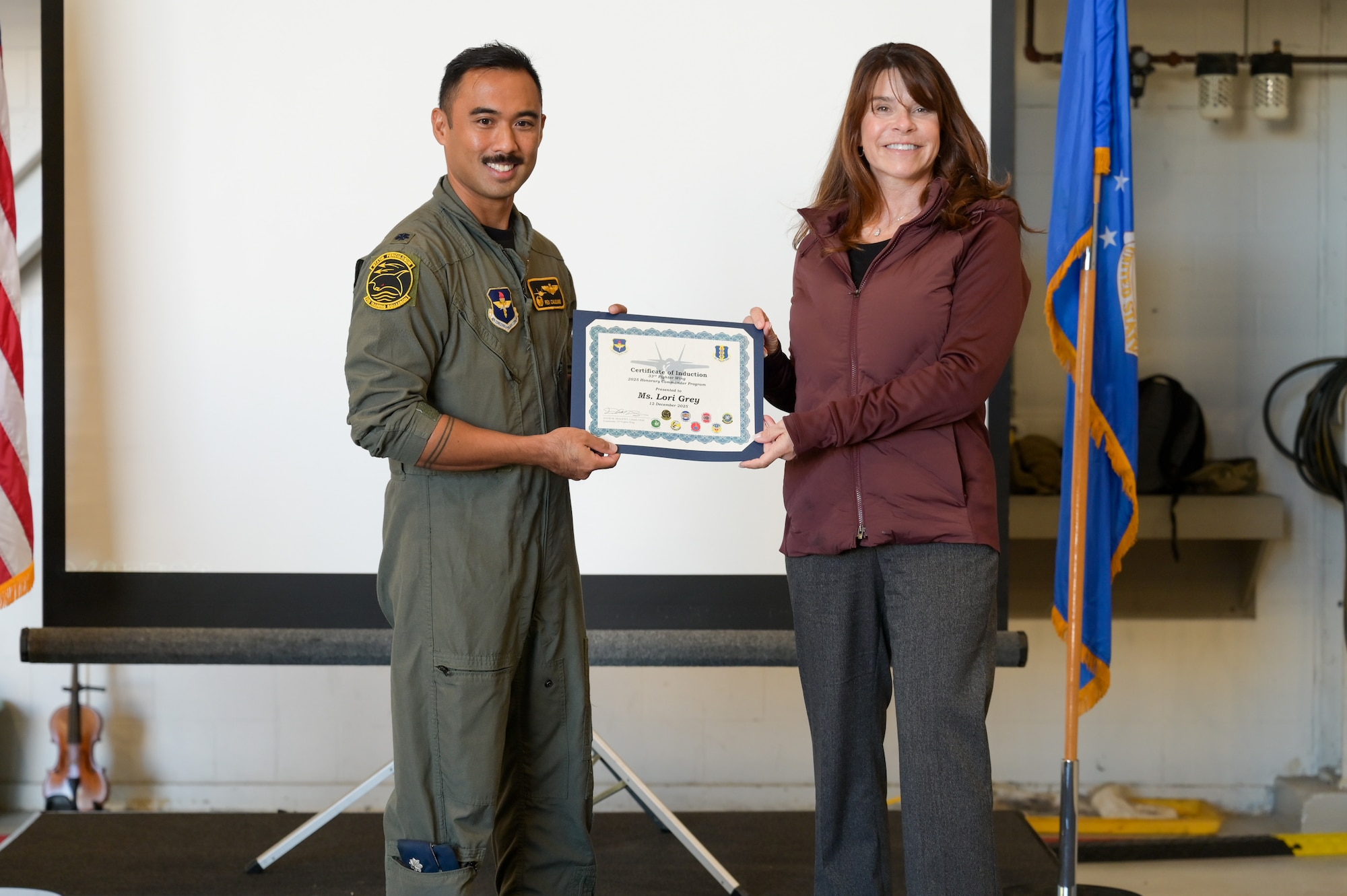 A photo of people posing.