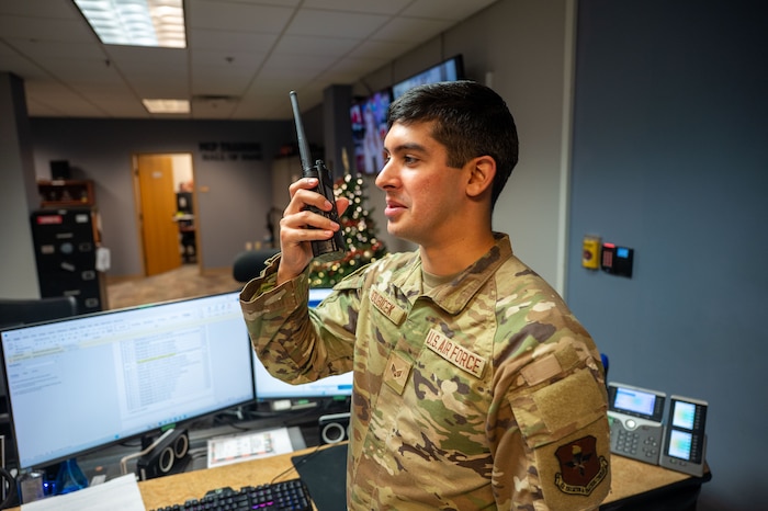 U.S. Air Force Senior Airman Noah Roubicek, 42d Wing Support Agency Command Post emergency actions controller, performs a radio check at Maxwell Air Force Base, Alabama, Nov. 25, 2025.