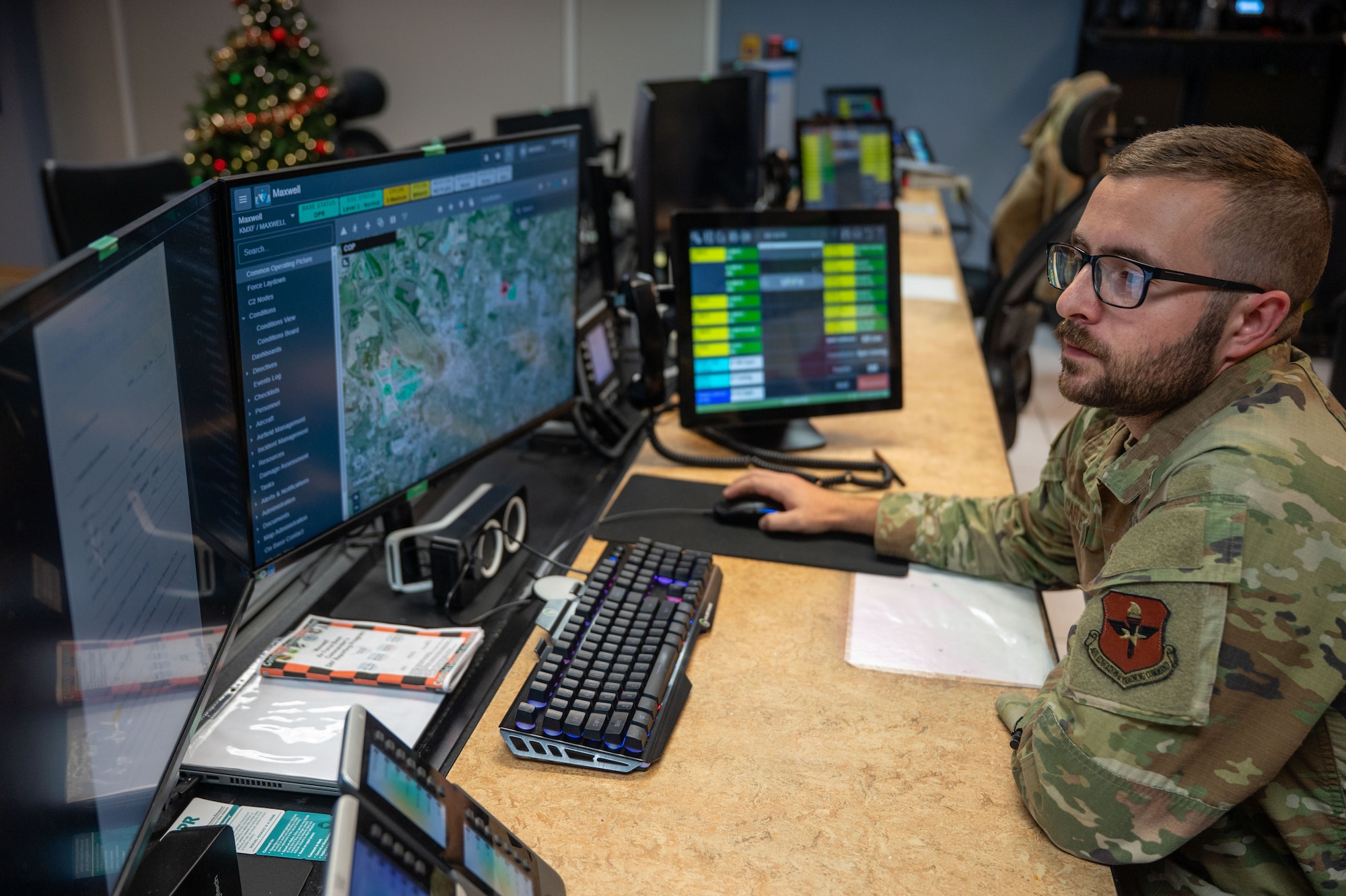 U.S. Air Force Tech. Sgt. Joseph Carter, 42d Wing Staff Agency Command Post noncommissioned officer in charge of Command and Control Operations, runs through system checks on C2IMERA at Maxwell Air Force base, Alabama, Dec. 12, 2025. The