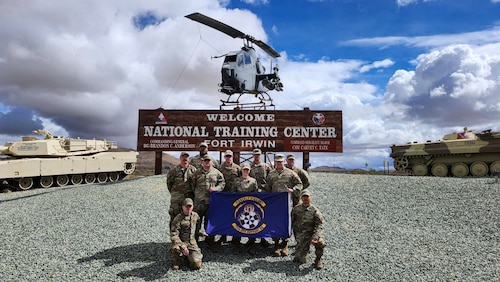 752nd Operations Support Squadron Airmen pose for a photo after Project Convergence Capstone 5 at the National Training Center, Fort Irwin, Calif., March 11, 2025. PC-C5 provided a controlled environment for rapid fielding and data collection on the Tactical Operations Center – Light’s performance under varying pressure. (Courtesy Photo)