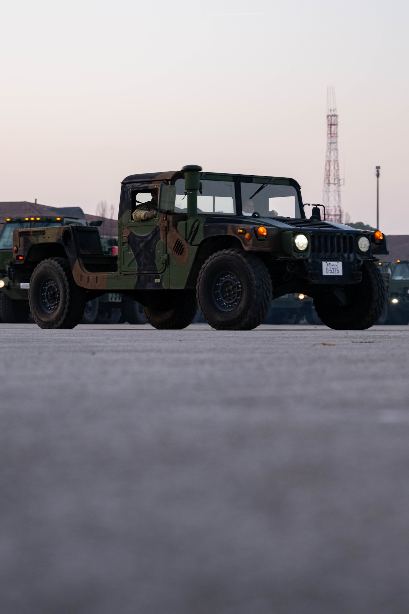 A Humvee joins a convoy.