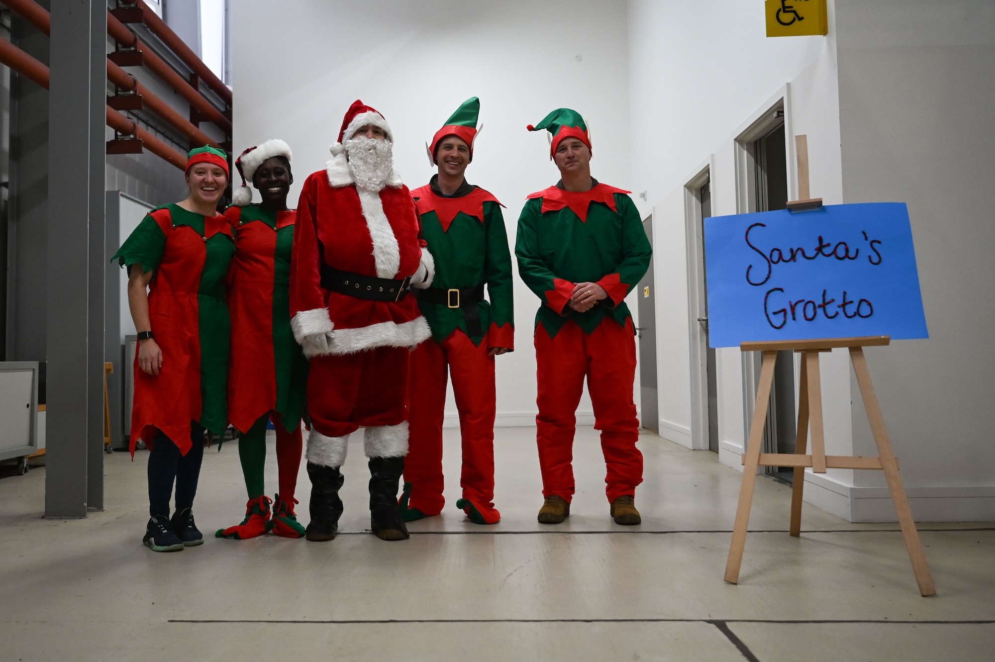 U.S. Air Force Lt. Col. David Bervig, 492nd Fighter Squadron commander, poses with fellow service members at the Imperial War Museum Duxford, Cambridge, England.