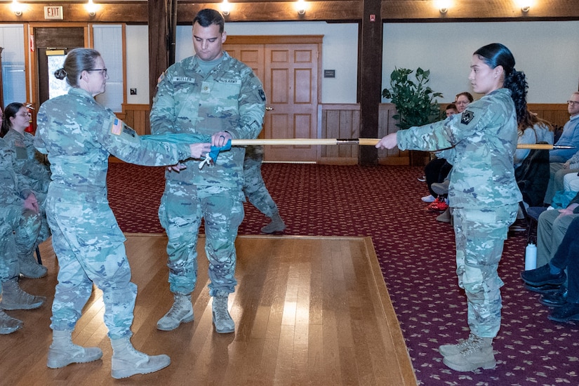 Ten Pennsylvania National Guard Soldiers from the 109th Mobile Public Affairs Detachment, 213th Regional Support Group were honored in a departure ceremony conducted at the Keystone Conference Center Dec. 13. The unit will deploy to Europe in support of U.S. Special Operations Command Europe. (Pennsylvania National Guard photo by Wayne V. Hall)