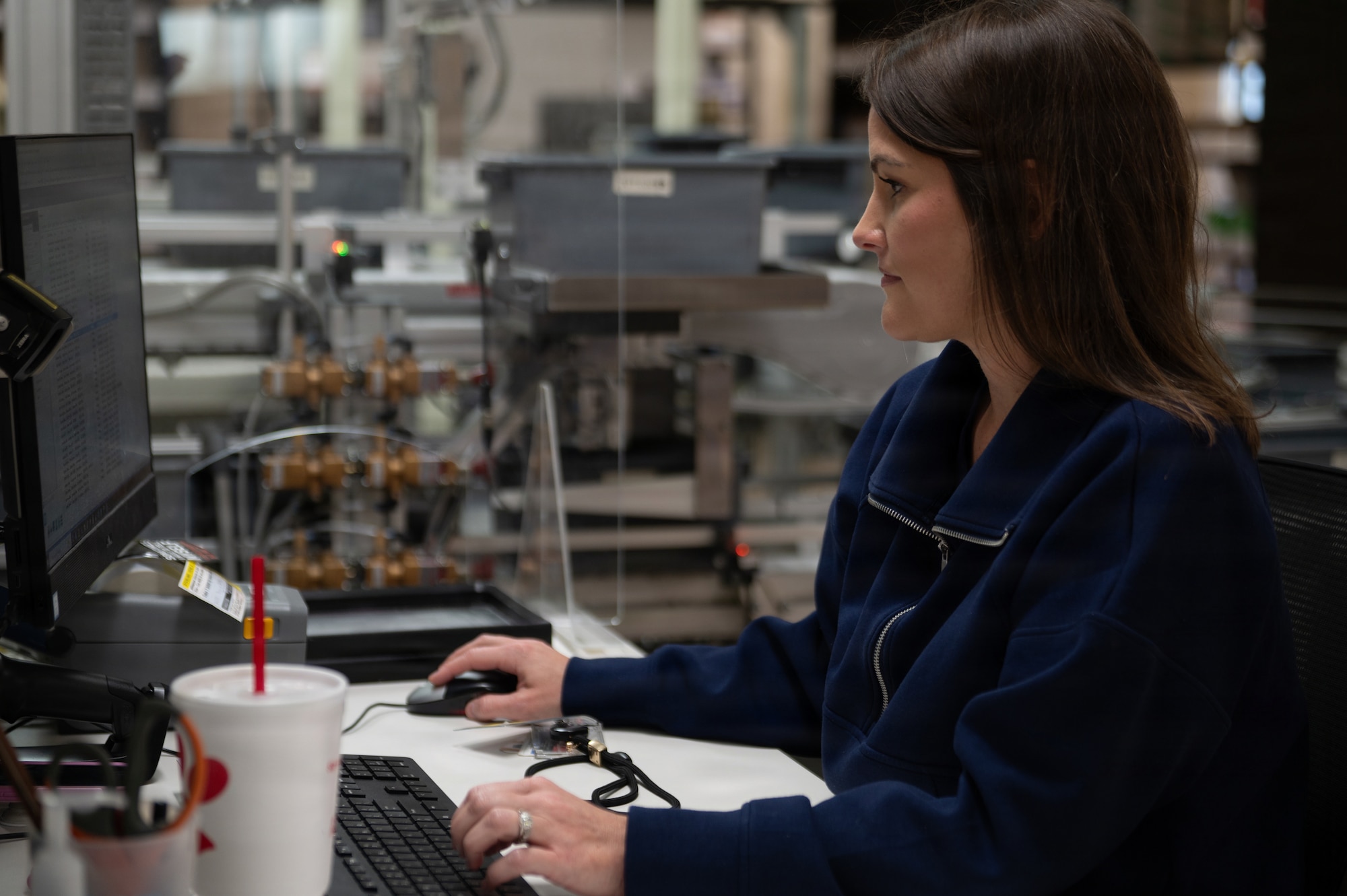 Hailey Weiner, 6th Medical Support Squadron pharmacist, processes medications at MacDill Air Force Base, Florida, Oct. 20, 2025. The pharmacy promotes mission readiness and upholds the health of all wing personnel by providing necessary pharmaceutical care and services. (U.S. Air Force photo by Airman 1st Class Autumn Lindor)
