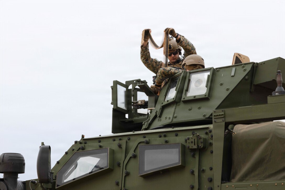 A U.S. Marine Corps combined anti-armor team loads ammunition during a live-fire exercise at Joint Base McGuire-Dix-Lakehurst, New Jersey, Dec. 6, 2025. Marines with 2nd Battalion, 25th Marine Regiment, 4th Marine Division, execute live-fire missions designed to sustain and refine tactical decision-making, leadership, and technical proficiency. The training improves unit readiness and ensures Marines maintain combat capabilities against armored threats. U.S. Marine Corps photo by Lance Cpl. Breysson Villacortacampos.)