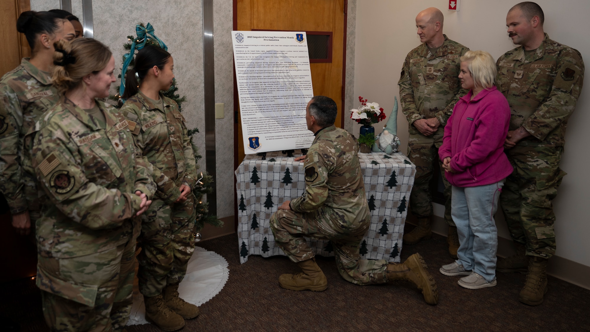 Airmen gather for a proclamation signing