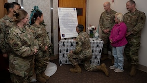 Airmen gather for a proclamation signing