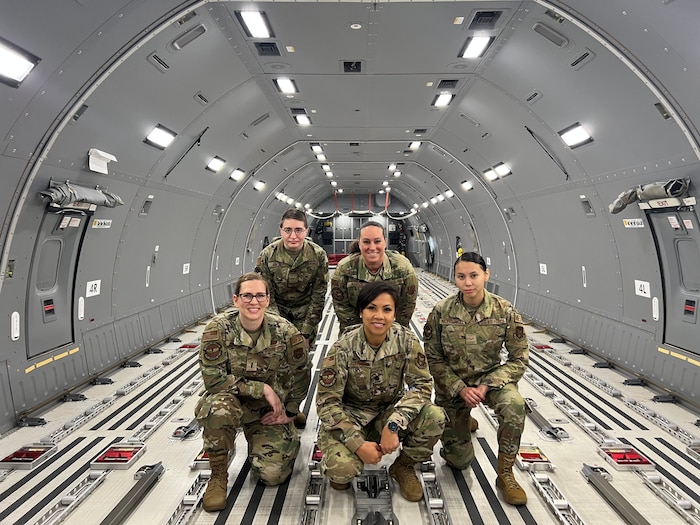 Image of Airmen posing for a photo.