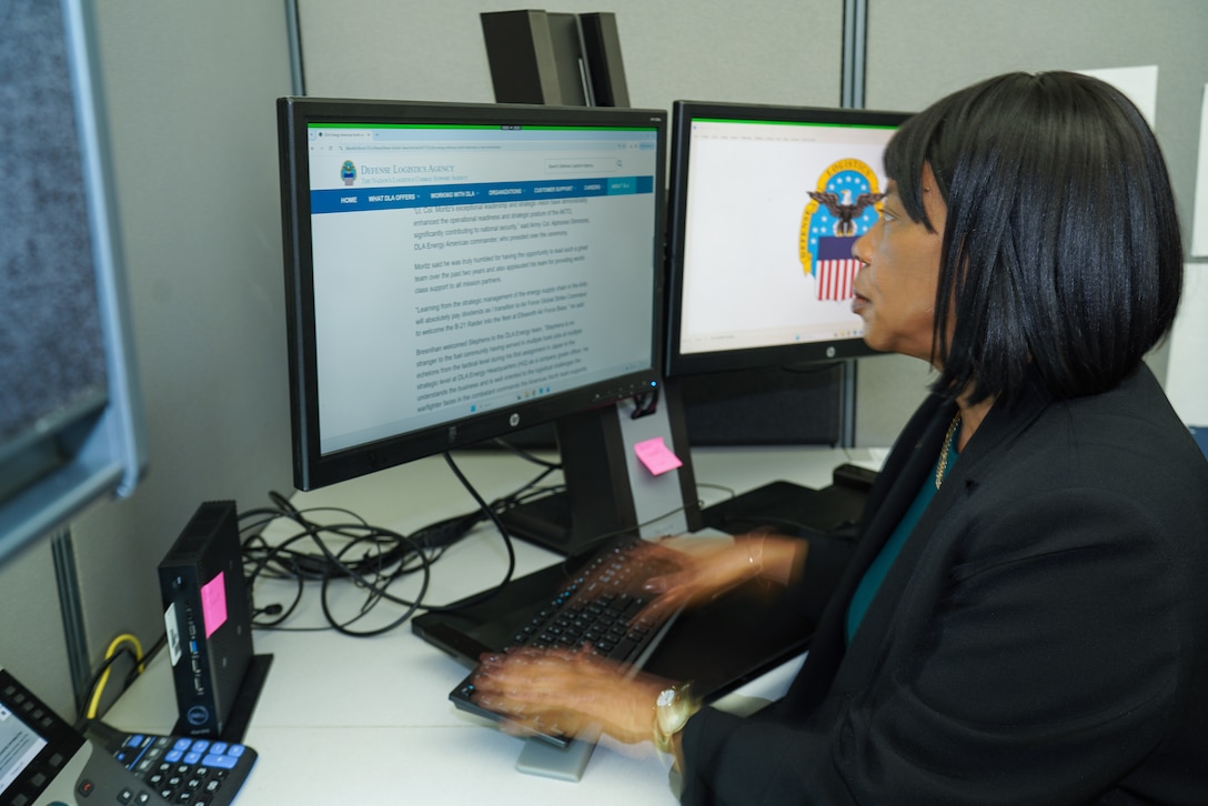 Woman sitting at computer
