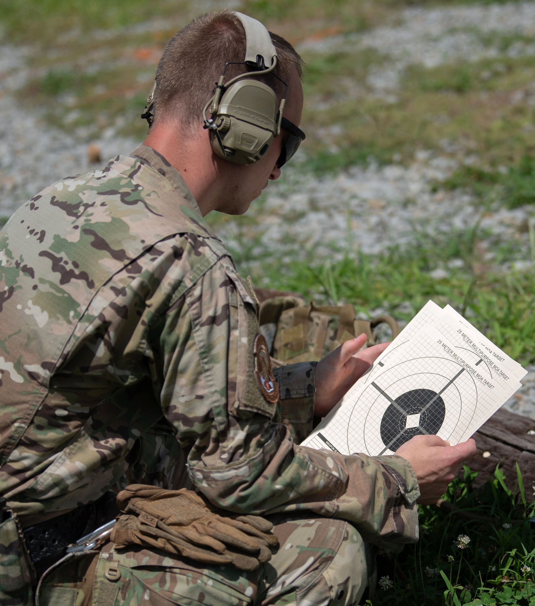 Tech. Sgt. Michael Bradley of Kentucky Air National Guard’s 123rd Special Tactics Squadron prepares targets July 12, 2025 during the Adjutant General’s Match, a marksmanship competition held at the Wendell H. Ford Regional Training center in Greenville, Ky. The event tested Soldiers and Airmen with realistic, combat-focused shooting scenarios designed to sharpen weapons proficiency and lethality. (U.S. Air National Guard photo by Airman 1st Class Angelee Barnett)
