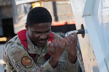 Airman 1st Class Nykus Borders, 91st Missile Maintenance Squadron missile maintainer, performs maintenance operations during Operation Bully Stick near Minot Air Force Base, North Dakota, Oct. 23, 2025. Operation Bully Stick requires missileers to complete a weeks worth of tasks in under 16 hours. (U.S. Air Force photo by Airman 1st Class Vincent Padilla)