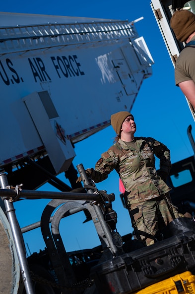 Senior Airman Sierra Smith, 91st Missile Maintenance Squadron missile maintainers, performs maintenance operations during Operation Bully Stick near Minot Air Force Base, North Dakota, Oct. 23, 2025. Operation Bully Stick is an exercise designed to test the wing’s ability to rapidly generate intercontinental ballistic missile (ICBM) readiness under agile combat employment (ACE) concepts. (U.S. Air Force photo by Airman 1st Class Vincent Padilla)