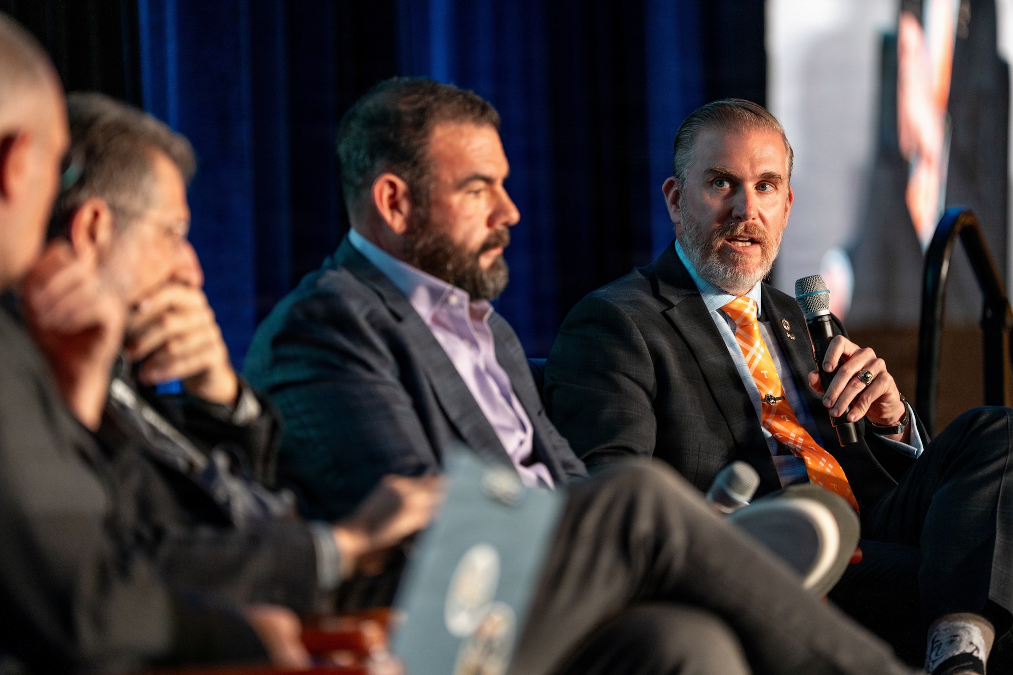 Space Force leader speaking at a conference in uniform. They are on stage.