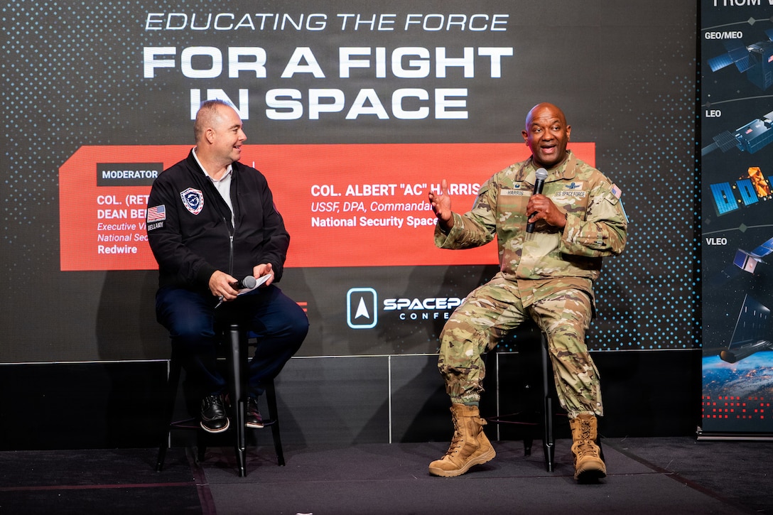 Space Force leader speaking at a conference. They are on stage.
