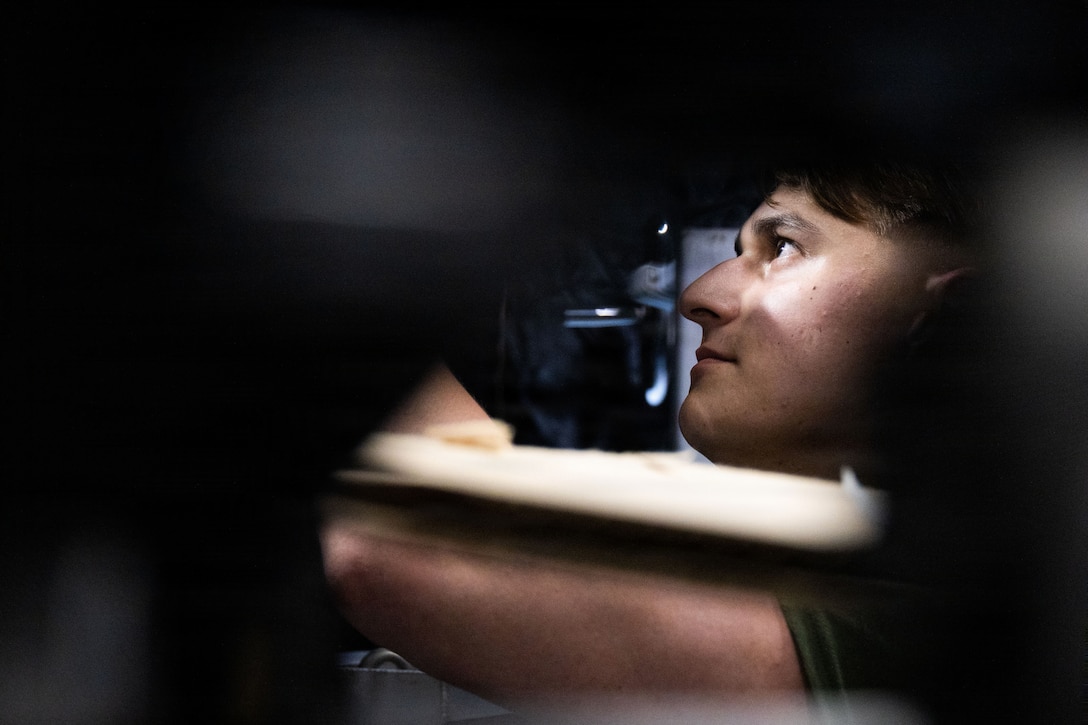A U.S. Marine Corps flight equipment technician with Marine Fighter Attack Squadron (VMFA) 225, U.S. Marine Corps Forces, South, installs a Flexible Linear Shaped Charge on a U.S. Marine Corps F-35B Lightning II canopy assigned to VMFA-225 at Jose Aponte de la Torre Airport in Ceiba, Puerto Rico, Dec. 9, 2025.  U.S. military forces are deployed to the Caribbean in support of the U.S. Southern Command mission, Department of War-directed operations, and the president’s priorities to disrupt illicit drug trafficking and protect the homeland. (U.S. Marine Corps photo)