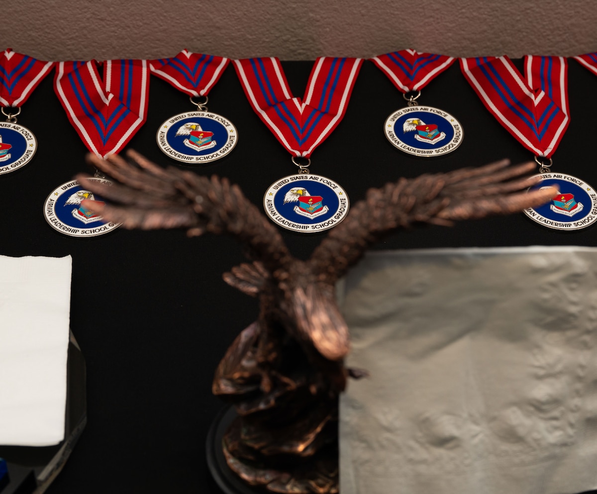The Airman Leadership School Graduates' medals lay ready for the graduation ceremony.