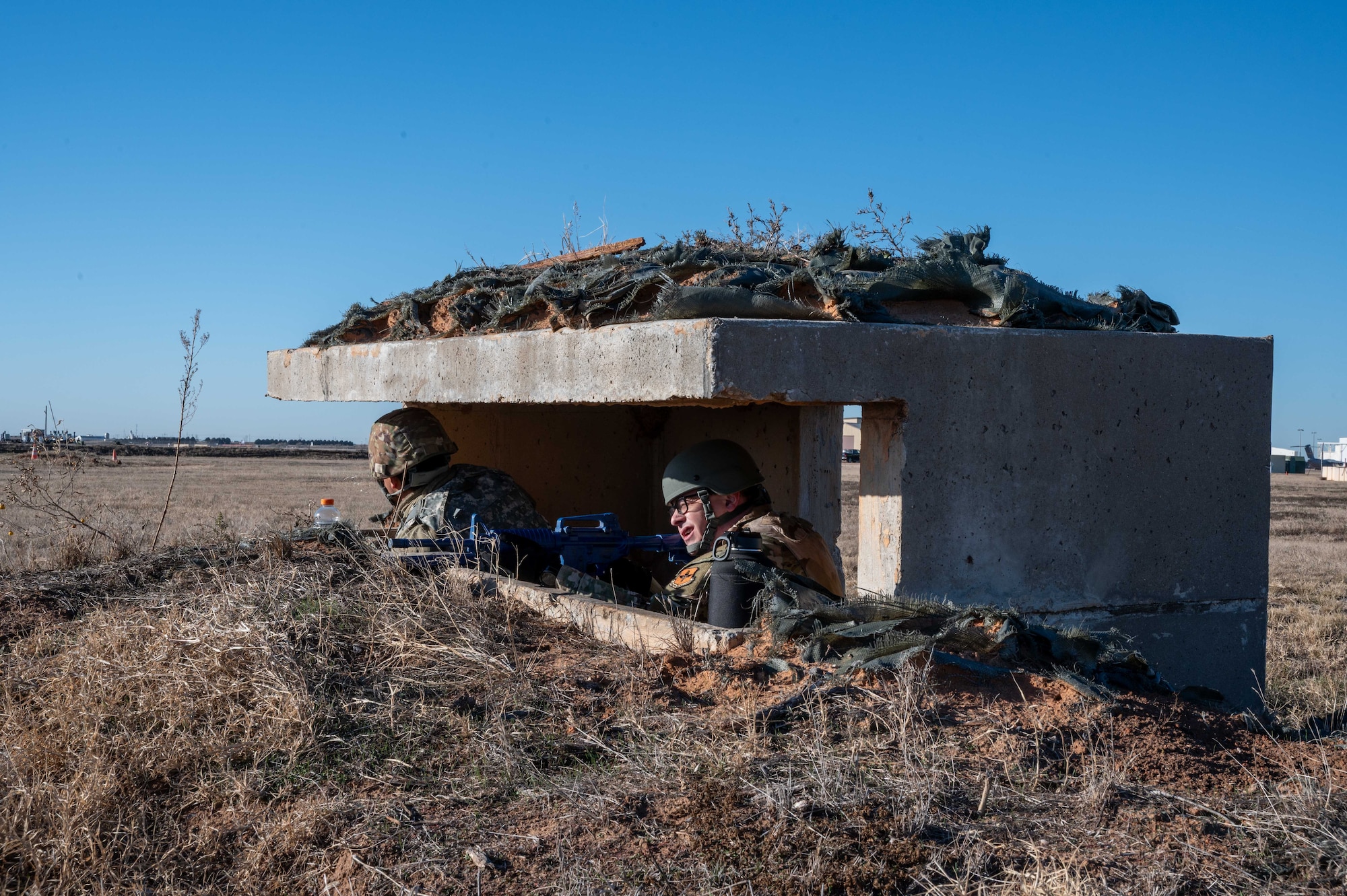 two people are in a bunker