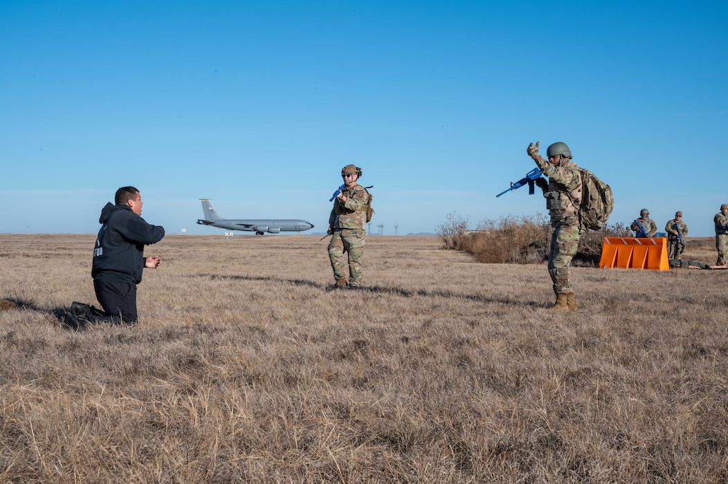 two people challenge an approacher