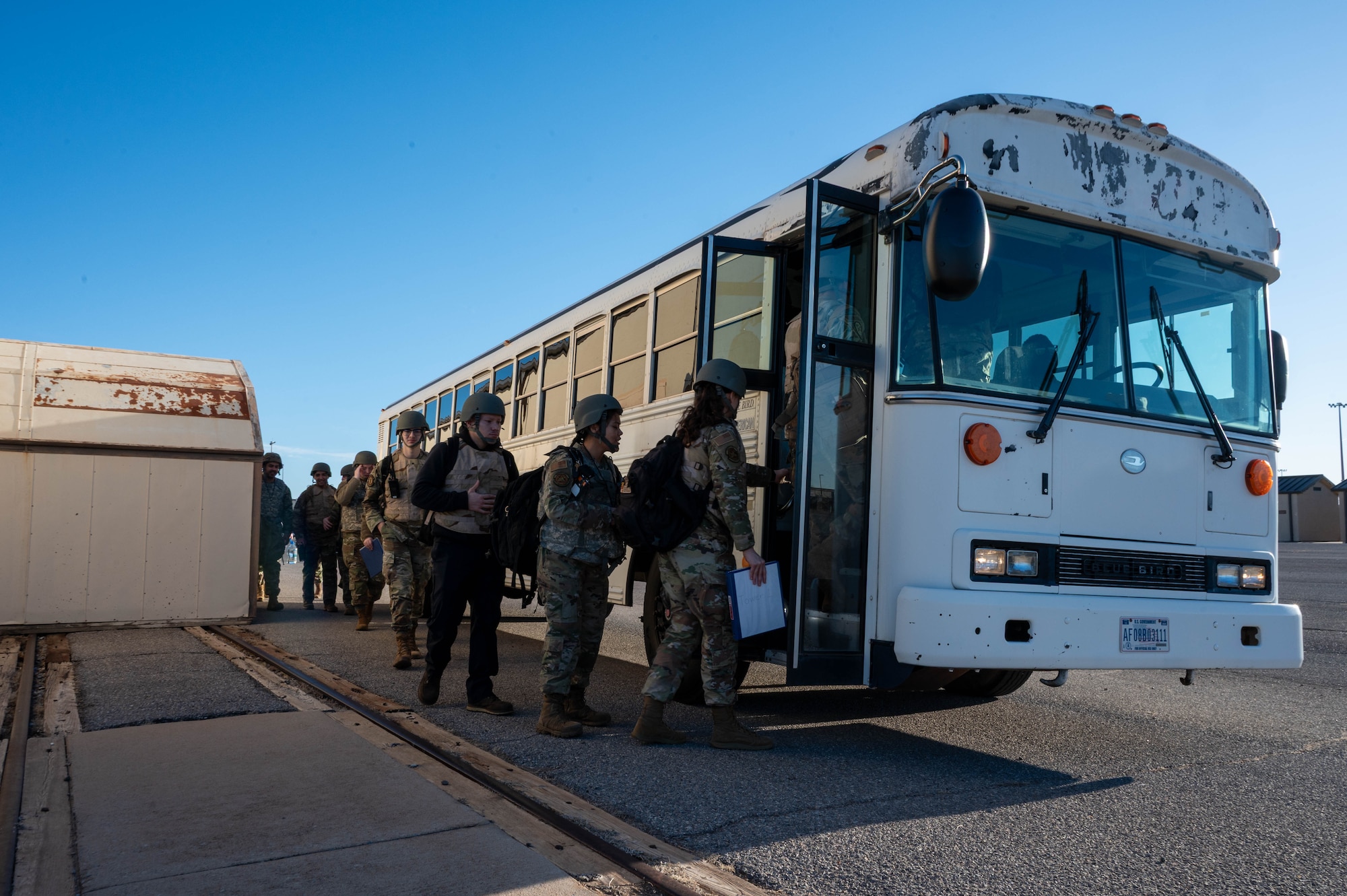 People board a bus