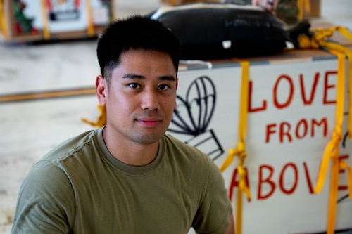 U.S. Air Force Senior Airman Joshua Gakud, 374th Air Expeditionary Wing combat mobility flight combat mobility technician, poses for a photo.