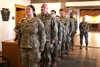 U.S. Soldiers with the 109th Mobile Public Affairs Detachment, 213th Regional Support Group, Pennsylvania Army National Guard are honored during a departure ceremony at the Keystone Conference Center at Fort Indiantown Gap, Pennsylvania, Dec. 13, 2025. The ceremony marked the unit’s upcoming deployment to Germany in support of United States Special Operations Command Europe, recognizing the Soldiers’ readiness to support public affairs operations in a multinational environment. (U.S. Army National Guard photo by )