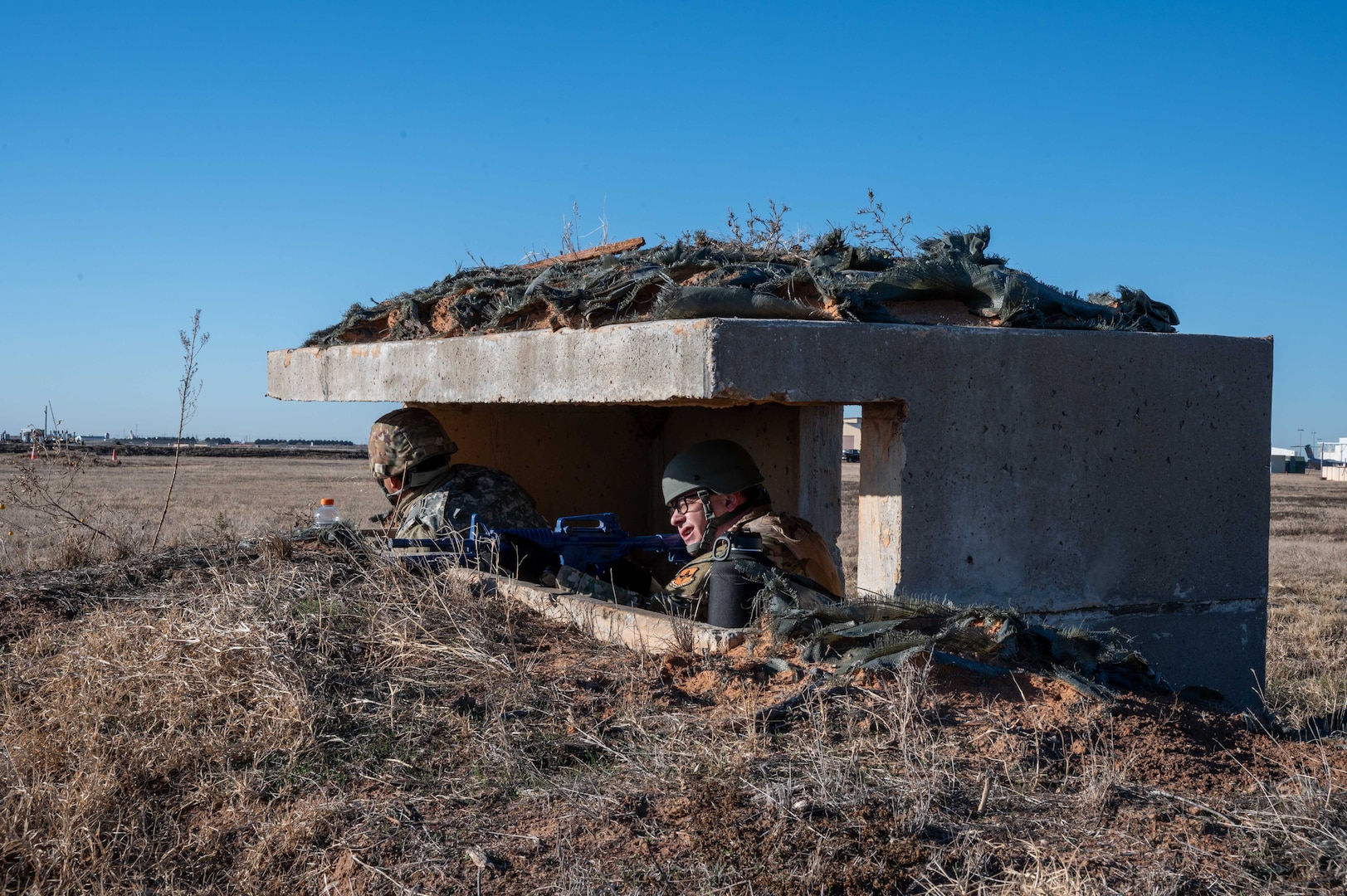two people are in a bunker